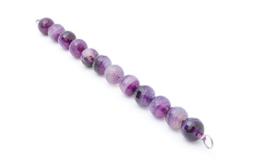 Bracelet with purple beads isolated