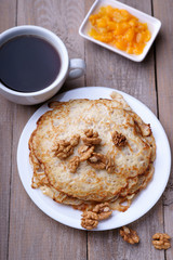 Pancakes, jam, walnuts and coffee