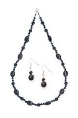 Fototapeta premium Black necklace with earrings isolated