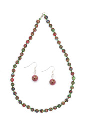 set of necklace and earrings from natural stones isolated