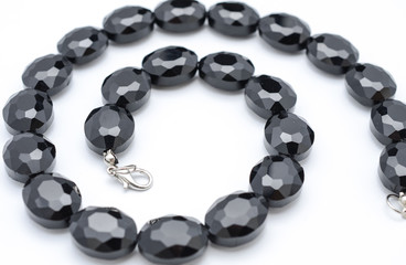 Necklace with black stones isolated