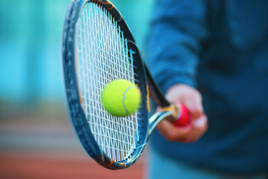 Tennis racket and ball