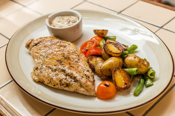 Roast chicken fillet and vegetables