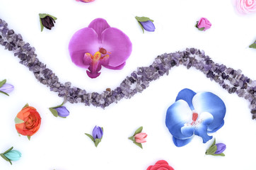 beads and flowers on white