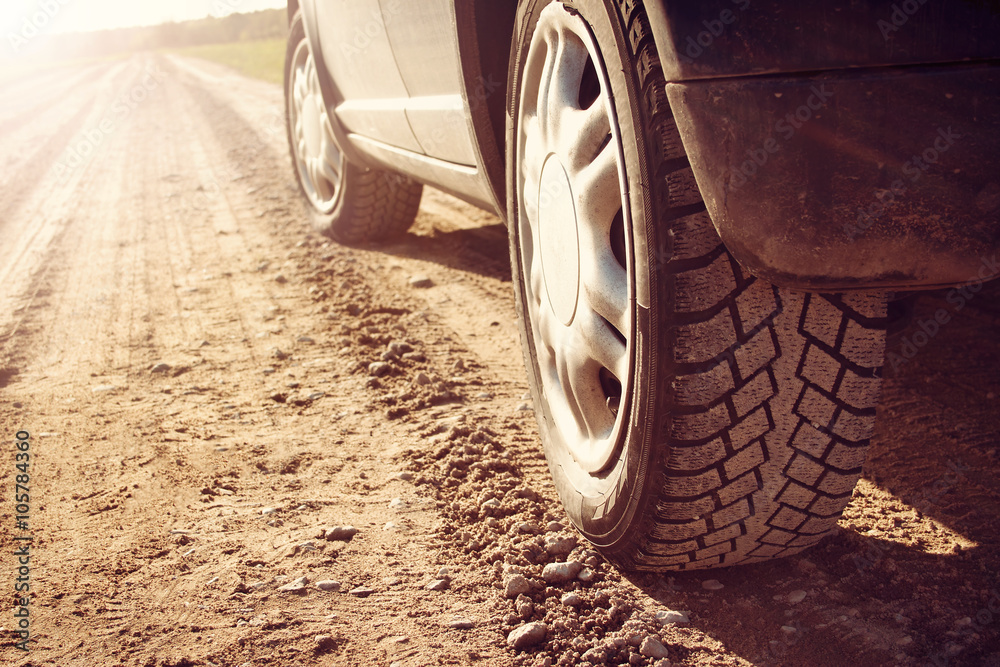 Canvas Prints car tire on dirt road