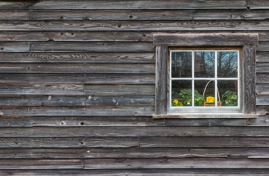 Window of old wooden log house