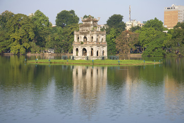 Fototapeta na wymiar The Turtle tower on the sword Lake in the afternoon sun. Hanoi