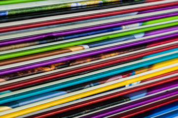 Close up of colorful children encyclopedia foredges, diagonal, abstract