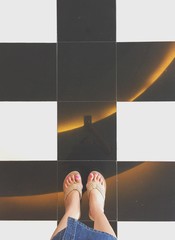 standing on black white floor