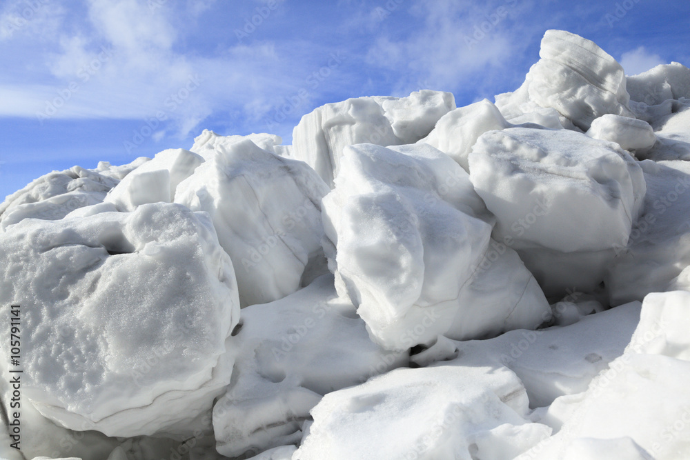 Wall mural Mound of snow and ice in springtime