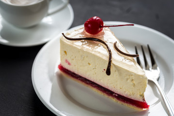 Raspberry cheesecake with sweet cherry