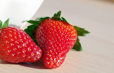 fresh ripe strawberries on wooden background