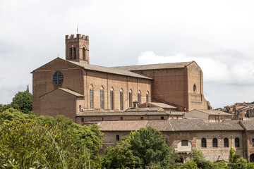 Fototapeta na wymiar Sienna, church San Domenica, brick basilica in the north of the city, Tuscany, Italy