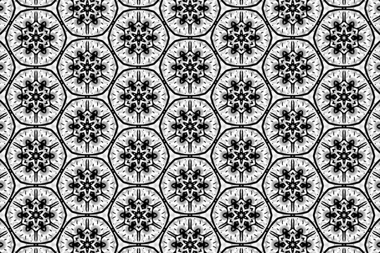 Black-and-white ornament with different elements. 
k