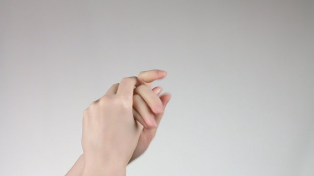Two stroking hands and arms.