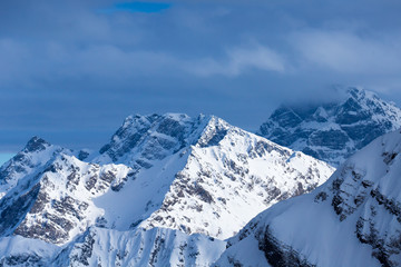 Fototapeta na wymiar top view to Caucasian mountains peaks covered by snow 
