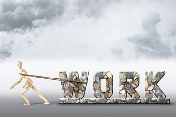 Concept of the hard work. Abstract image with a wooden puppet
