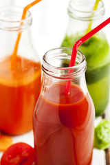 Fototapeta na wymiar Fruits and vegetable juice in bottle