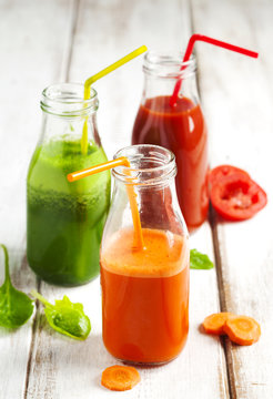 Fruits and vegetable juice in bottle.
