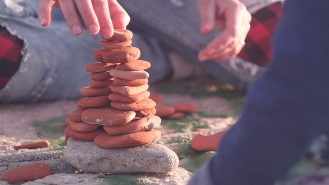building a pyramid from pebble stones