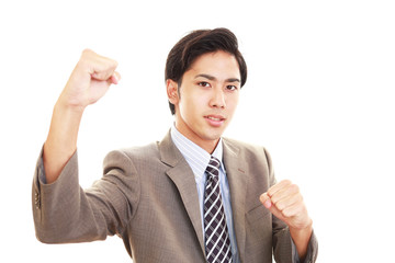 ガッツポーズのビジネスマン