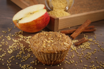 Fresh muffin with millet groats, cinnamon and apple baked with wholemeal flour, delicious healthy dessert