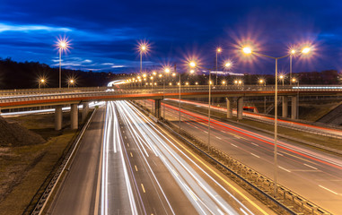 Fototapeta na wymiar car light trails on motorway junction