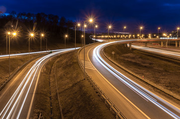 car light trails on motorway junction