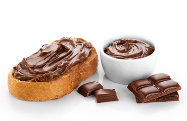 Toast and bowl with chocolate butter isolated on white backgroun