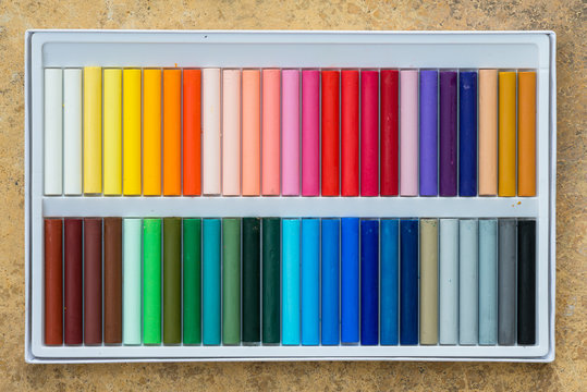 Colorful oil pastels in a box