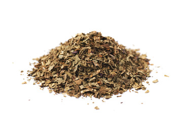 Pile of dried basil seasoning isolated