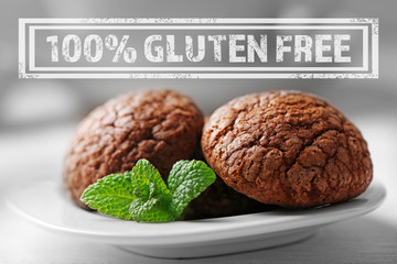 Chocolate chip cookies on plate with mint and gluten free sign, closeup