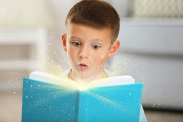 Child with magic book
