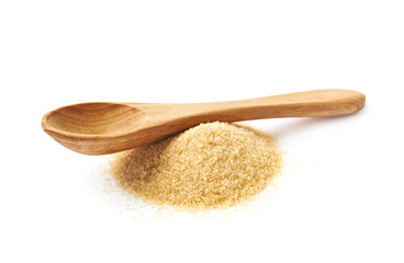 Spoon over pile of sugar