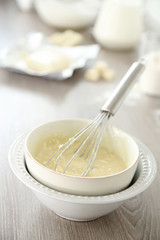 Cooking buttery cream on kitchen