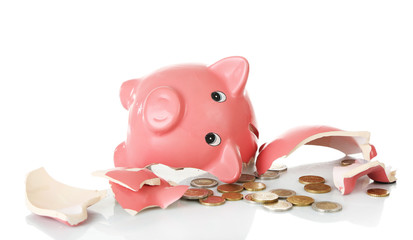 Broken piggy bank isolated on white background