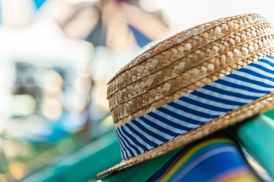 Woven hat on the beach chair
