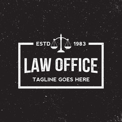 law office logo on grunge black background