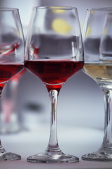 Wine glasses with red and white wine, closeup