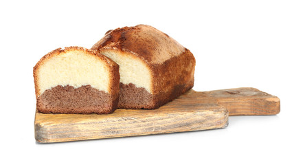 Delicious sweet cake bread on wooden cutting board isolated on white