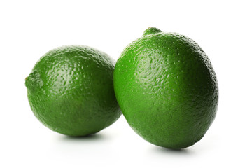 Two limes, isolated on white