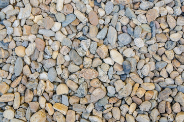 Abstract background with decorative floor pattern of gravel stones, Gravel colorful rock texture