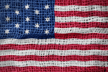 United States flag on sackcloth textured background