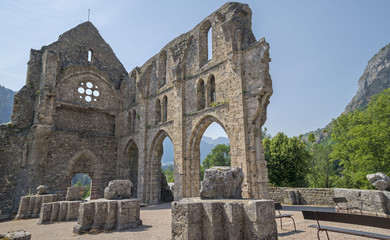 Fototapeta na wymiar Abbey of Saint Jean d'Aulps , France - an area of two hectares with the remains of the abbey church , considered a jewel of Cistercian art , a medieval garden with medicinal plants and a museum.