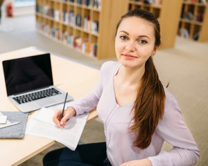 Student girl studying at library