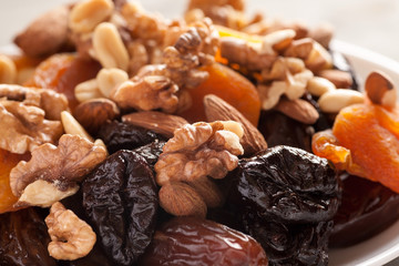 Mix of dried fruits with nuts closeup