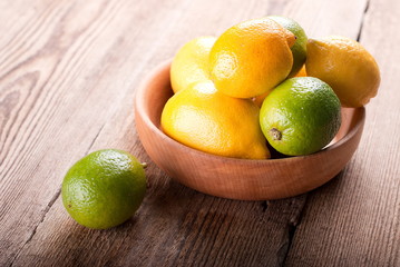 Lemons in a bowl on a table