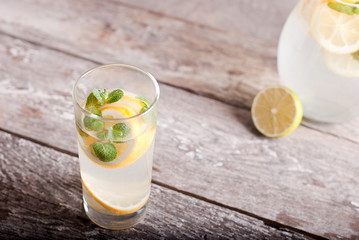 glass and carafe with lemonade