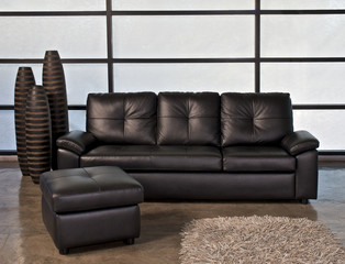 Black leather sofa for home or office