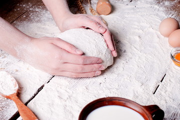 Fototapeta premium dough in the hands of